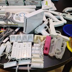 1 Nintendo Wii console + 4 controllers + Wii Fit + 34 games + many accessories including stearing wheels, fishing rod, light sabers and guns adaptors. It comes with many battery packs but those are very old and might need replacing.