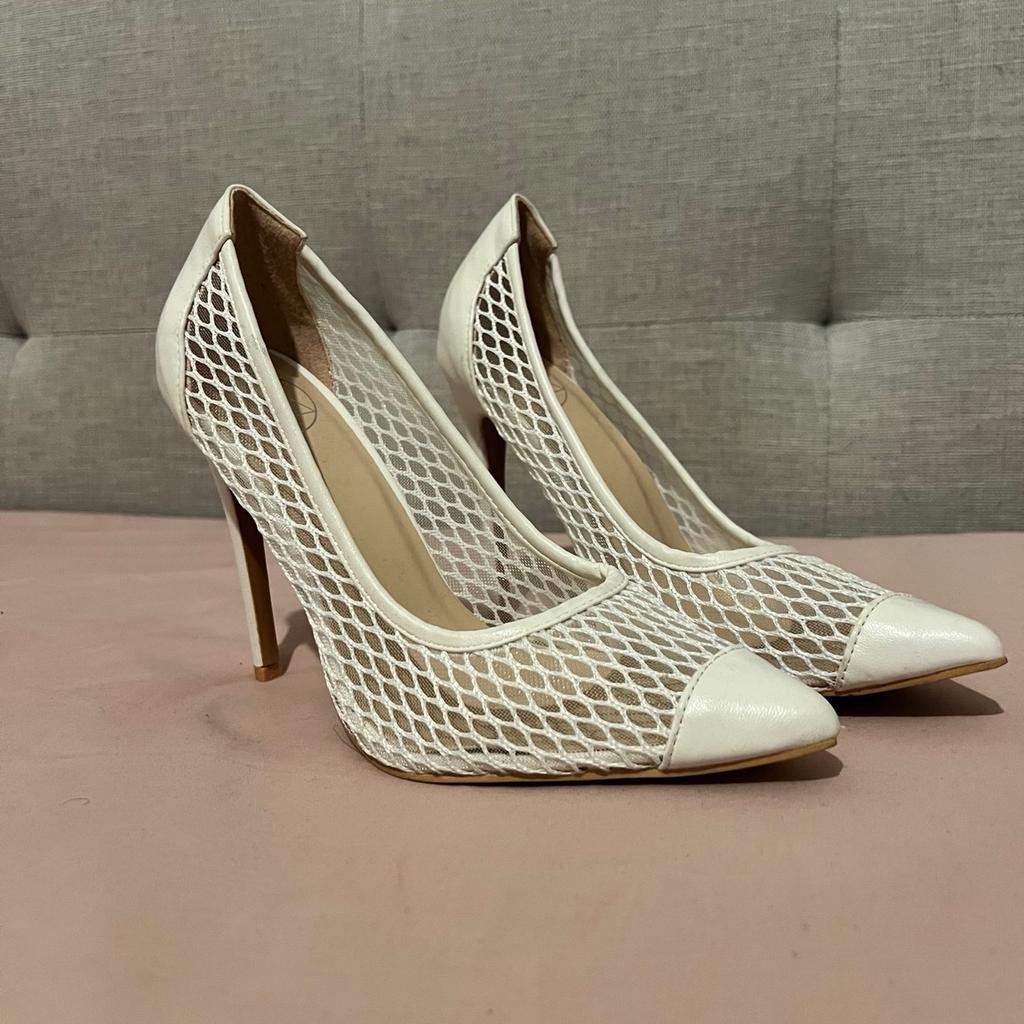 Lace white high heels 4.5, It is in very good condition just like new comes with out a box, brand miss Selfridge collection from oldbury