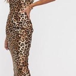 Leopard print satin midi dress cut on a bias cut. Only worn once for few hours, lovely to dress up with a pair of heels or dress fown with boots or trainers