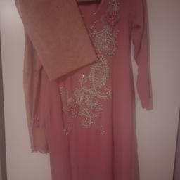 Pink Rhinestone Lines Shalwar Kameez 3 Piece Suit

Fits Size 8 Small

Handmade suit in dusty pink colour decorated with Rhinestones and Beading

Includes a net scarf with and wide style plain trousers

Worn once, excellent condition, like new

Measurements:

Length approx 95cm
Underarm to Underarm - 42cm

Any additional questions please ask

Free local delivery from Birmingham B9 or will post out for additional charge