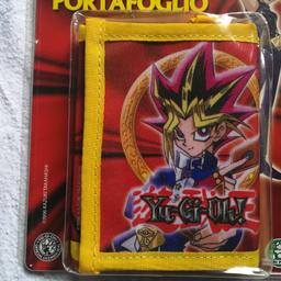 Vendo a VARESE portafoglio Yu-Gi-Oh! come da foto. Nuovo, ancora imballato, mai aperto.