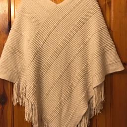 Cream Poncho with sequins 

If you love a chic accessory, you've come to the right place. Soft and stylish, this cream poncho is decorated with metallic detailing to add a lovely bit of shimmer into the design.

Unwanted 

Can post out at a extra cost