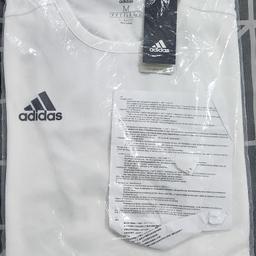 Adidas Climalite White Sport Shirt

Size: Medium

Black sleeves