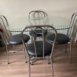 Glass dining table with four chairs in good condition .
Pick up only,
Denton burn area