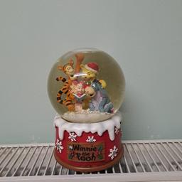 Winnie the pooh musical snow globe.  Plays, we wish you a merry Xmas. From a non-smoking home. Buyer to collect, Thanks