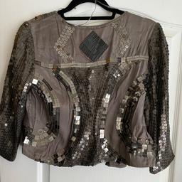 New never worn brown embellished sequin jacket for sale UK size 10 petite sold as seen price as advertised no time wasters please for collection.