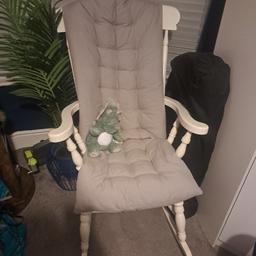 fab condition. 
solid rocking chair 
I bought seat cushion separately