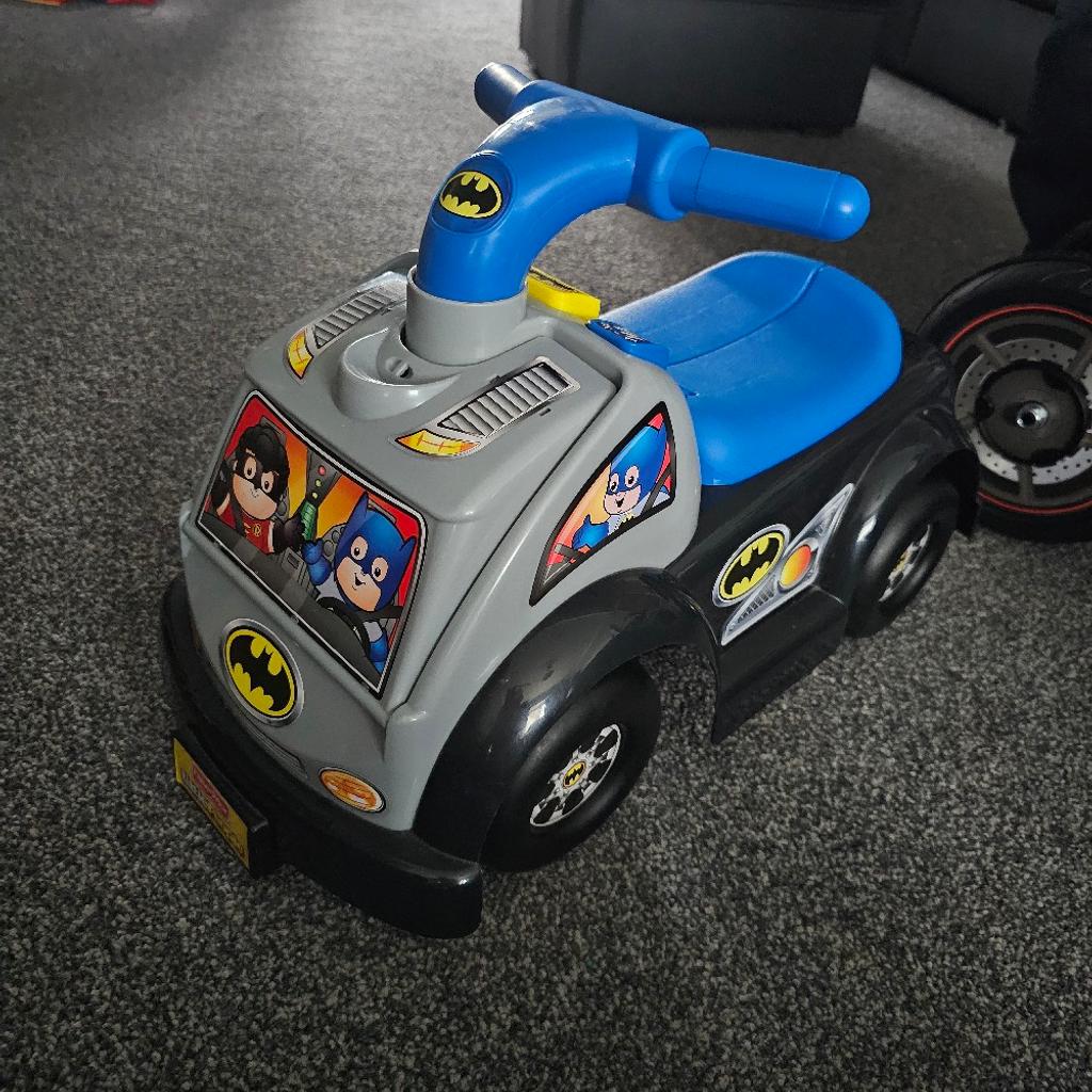 Batman Litttle People, ride on car, excellent condition only been used in house. pull down race ramp complete with batman and joker cars. 3 talking buttons to press all excellent working order. seat lift up to put whatever you want to inside. collection only please.