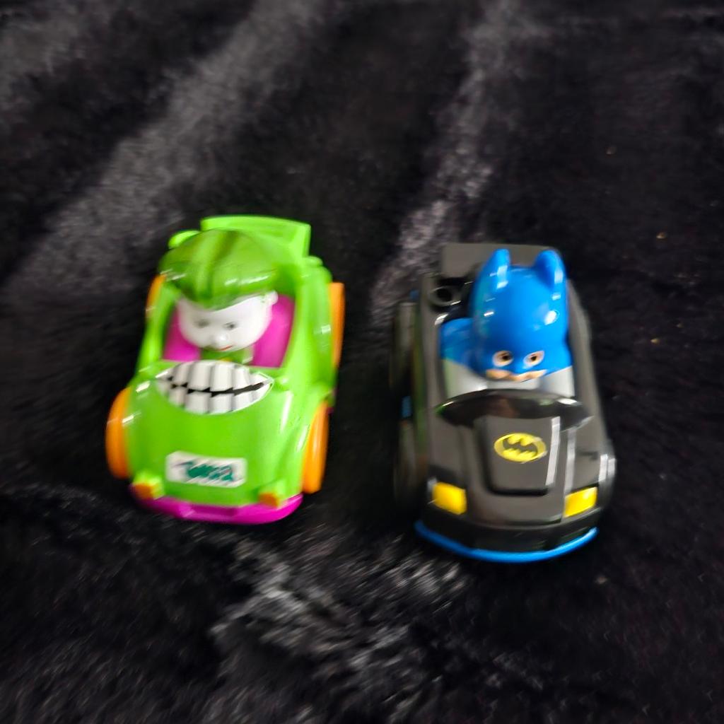 Batman Litttle People, ride on car, excellent condition only been used in house. pull down race ramp complete with batman and joker cars. 3 talking buttons to press all excellent working order. seat lift up to put whatever you want to inside. collection only please.