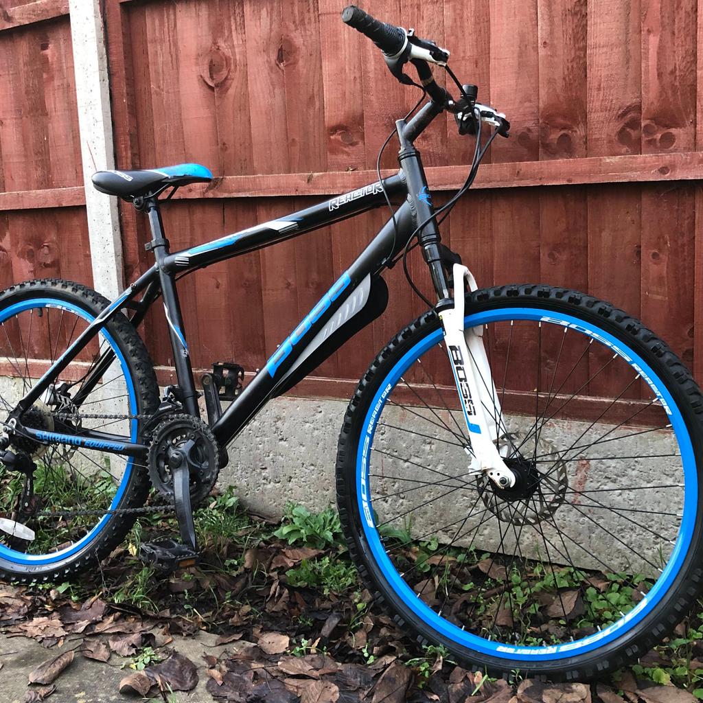 Frame: 6061 Alloy
Fork: Front suspension fork
Gears: Shimano 21 speed gears
Front and Rear Brakes: Clarks EXO Hydraulic Disc brakes
Rims: Double wall alloy wheel rims with Boss branded graphics
Tyres: 26 x 2.1" wide off-road MTB tyres with deep tread