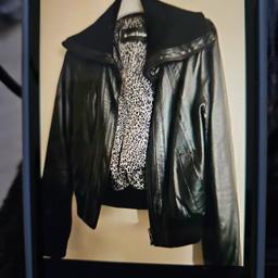 Genuine black leather bomber jacket, size 10. Warn a few times. Collection is between Angel and Old Street, opposite McDonald's. There is a post box on this street. Please note that I have commitments during the weekdays so please be patient. If you choose more than one item that I am selling I will give you a good deal.