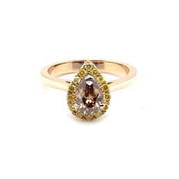 This exquisite 18ct gold ring features a stunning pear-shaped brown diamond with 18 smaller gemstones surrounding it. The multi-tone gold band is 2.5mm wide and is set with a total of 0.88ct of natural diamonds. This beautiful ring is sized N and is perfect for any special occasion including engagements, anniversaries, birthdays or Valentine's Day.

Completely unique hand made 18ct yellow setting securing yellow diamonds & rose shank with a platinum head securing a Brown ( Connacht ) pear shaped diamond 0.73cts with 0.15cts yellows

Crafted with love and care, this handmade ring is a unique piece of fine jewellery that would make an ideal gift for a loved one. The solitaire with accents setting style and very good cut grade make this ring sparkle and stand out. Made in the United Kingdom with a metal purity of 18ct, this ring is a truly special piece that will be cherished for years to come.
