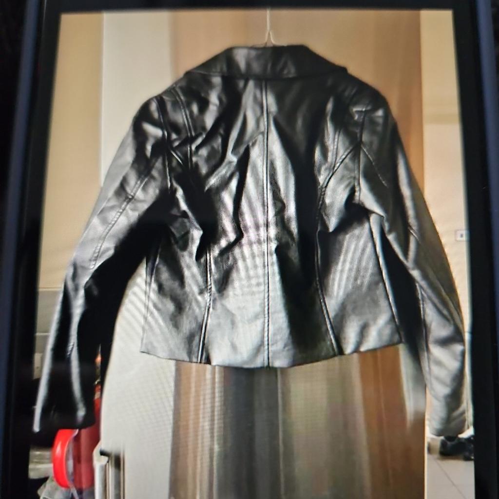 Black faux leather biker jacket, size 10. Worn a couple of times and in excellent condition. Collection is between Angel and Old Street, opposite McDonald's. There is a post box on this street. Please note that I have commitments during the weekdays, so please be patient. If you choose more than one item that I am selling I will give you a good deal.