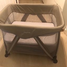Nuna Sena mini travel cot -safari colour-
High quality brand.
Purchase from John Lewis £120.

Ideal for holidays or away from home. Comes with a quality draw string bag with carry handle .

According to box “this product is intended for children from birth to 70cm/15kg. Discontinued use of the travel cot when the child is able to climb out.”

Condition is very good. As only been on 1 holiday abroad. Product itself is Pristine.
Travel bag has some marks due to airport handling (to be expected).

Item did not come additional quilted mattress but we have one that is almost new. Can come with item for free.

We still have original outer box too.

Please check my other baby related listings.

Thank you.