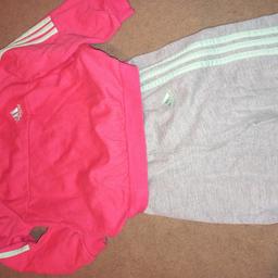 lovely girls Adidas tracksuit. Jumper pink with light green stripes, bottoms grey with light green stripe