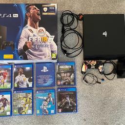 PlayStation 4 Pro, 1TB in amazing condition with Original box.
All original cables (power cable+HDMI+Charger cable).
1 controller (general wear & tear on left joy stick but will include thumb sick grips).
Original Ear piece.

Includes:
-FIFA 15 + 16 + 17 + 18 + 19
-PlayStation•Plus 14-Day Trial, FIFA Ultimate Team™ Rare Players Pack- for FIFA 18 (Still Sealed!)
-Call of Duty WWII
-Shadow of War
-GTA 5