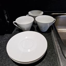 3 tea cups and saucers from viners. unusual design.