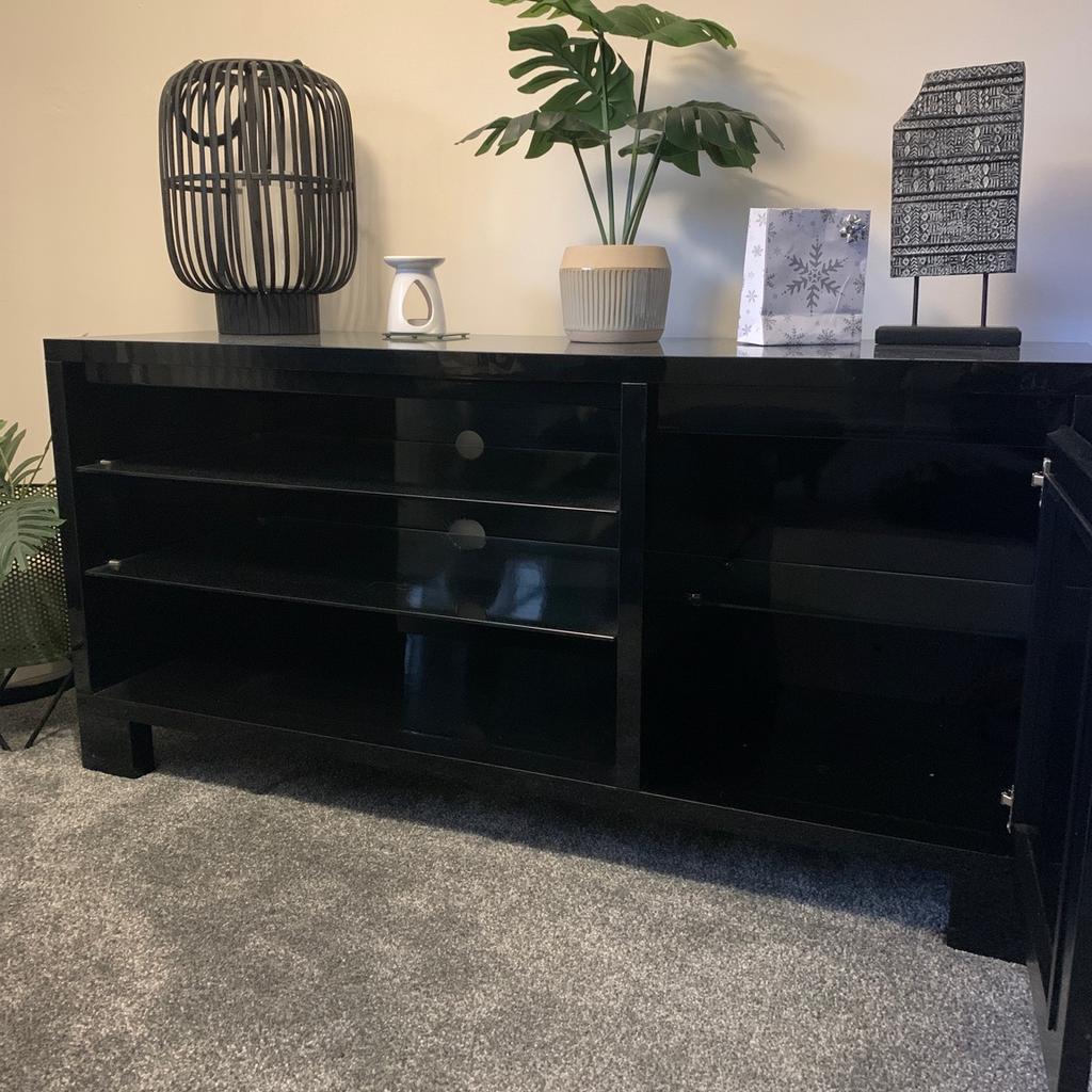 Beautiful solid Tv unit or sideboard from Next. 2 glass shelves and side compartment with glass shelf. Original cost £400