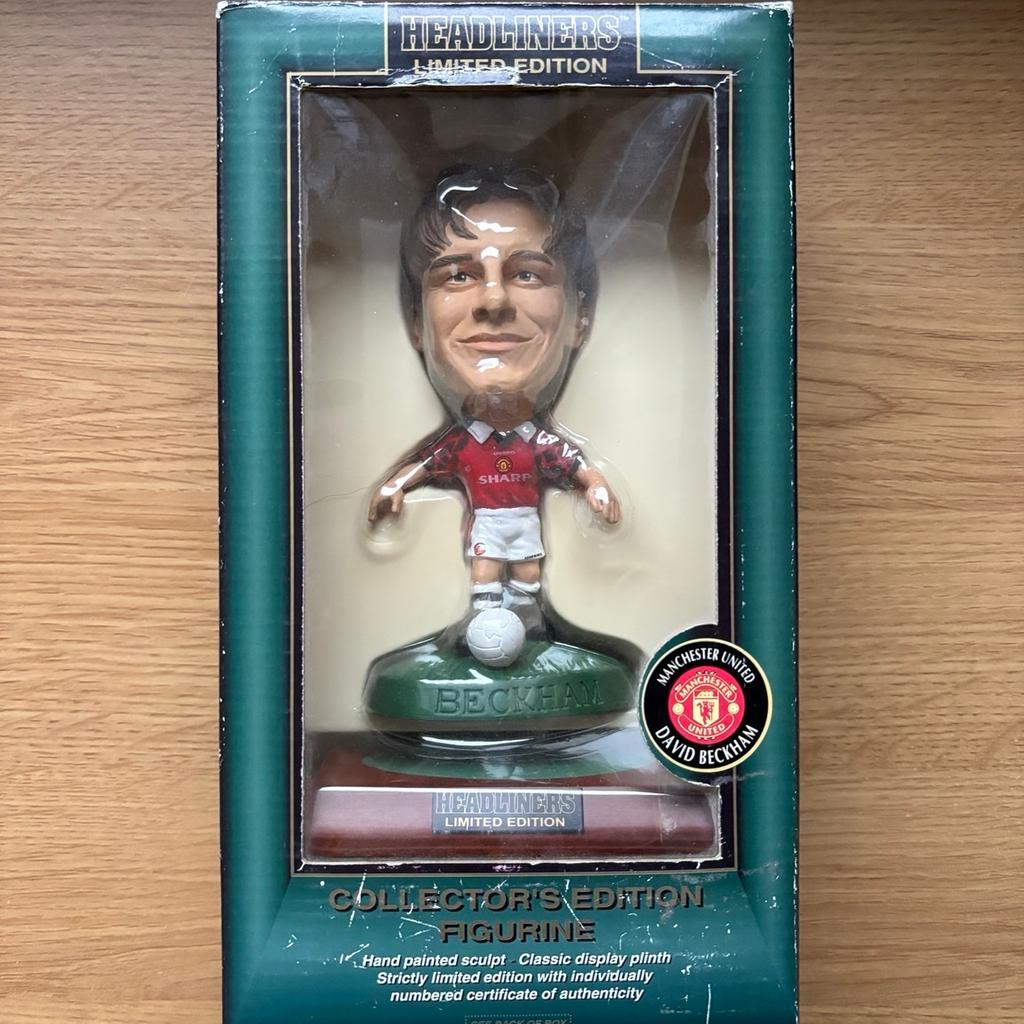 DAVID BECKHAM. MANCHESTER UNITED.

CORINTHIAN HEADLINERS XL EDITION, 1998. SERIAL NUMBER: 74003.

MUCH SOUGHT AFTER, C/W WOODEN STAND.

FREE DELIVERY.