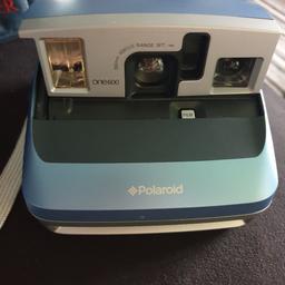One 600 Classic Vintage Polaroid Instant Camera in blue excellent condition hardly used comes with 3pocket Bag adjustable shoulder straps in blue and user manual included buyer collects..... THIS IS NOT A TOY NO TIME WASTERS & NO JOKERS ... NO LESS THAN £20.00 THANKU 