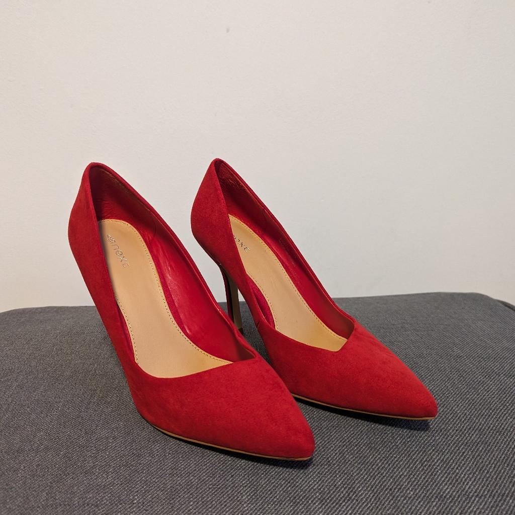 Next Red Heels. scuff on one heel and faint line on one heel (shown in pictures)
