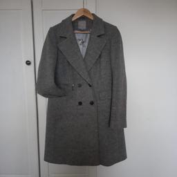 ladies size 12 wool mix coat. Worn once. 2pockets and fake zip pocket. Half belt to back. Grey and floral polyester lining. length from back neck to hem approx 40 inches. still has spare button  attached. see photos. Open to offers.