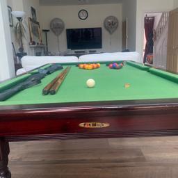 Indoor pool / snooker table for sale, used but well looked after and in good condition. This is a quality sturdy table measuring 6ft 6in by 3ft 9in. It comes with all pool balls and most snooker balls, triangles, cues and chalk. The pockets, cushions and surface playing area are all in good condition. Collection only from Finchley North London. The item is being advertised on another site so no time wasters please. Thank you