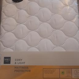 Brand new m&s mattress protector, single size.can post