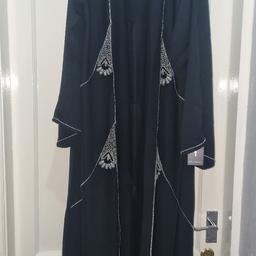 Brand New With Tags From Ben Harad. Price tag £54.99!
Ladies black full length open front Abaya/Jubba / Jilbaab / Burka with scarf.
Press Button fastening on the front
Black / White/ Clear bead details on the front and sleeves.
Size M
Bust: 22"
Length: 54"
Sleeve length: 22"

Smoke free home
All measurements are approximate.
All items of clothing (used) should be washed before use. Some items have been in storage.
Please take a look at my other items.
Collection Preferred from B23 or B9
£25 ono