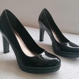 Black Tamaris heels. Very comfortable. They are brand new and never used them. They are size 4UK/37EU.