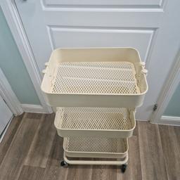 In good condition, only ever used for storage.

The sturdy construction and four castors make it easy for you to move the trolley and use it wherever you like. It even fits in tight spaces because of its small size.

Good for extra storage in your kitchen, hall, bedroom or home office.

Measurements (to the nearest 1/2 cm):

Including bars and wheels:
Height 78cm
Width 44cm
Depth 35cm

All 3 trays:
Height 8.5cm
Width 41.5cm
Depth 30cm

Material:
Steel, Epoxy/polyester powder coating