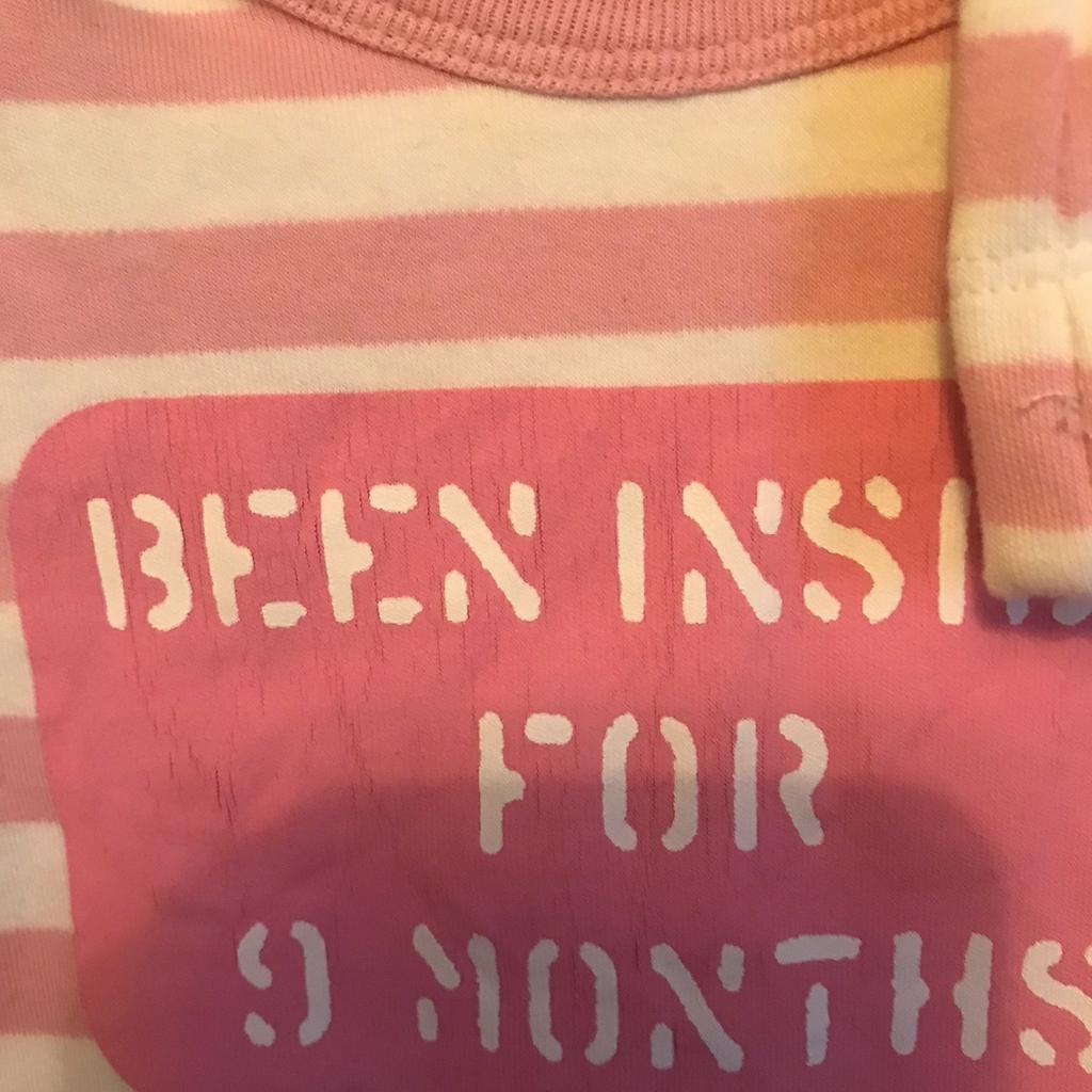THIS IS FOR A BRAND NEW PAIR OF DRESSES

1 X PINK AND WHITE STRIPS WITH LOGO "BEEN INSIDE FOR 9 MONTHS" COMES WITH MATCHING HAT - NEVER WORN - THE BODY SUIT HAS BEEN WASHED BUT THE HAT COMES WITH ORIGINAL TAG

PLEASE SEE PHOTO