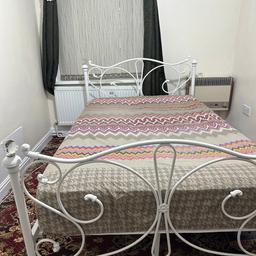 White metal bed frame with mattress 
One glass ball needs to be screwed on (requires any long screw)
Coffee stains on one side off mattress but can be cleaned of easily 
Excellent comfy mattress cool in summer warm in winter 
Pick up only 
Cash on collection
