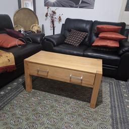 It's a lovely wooden coffee table for sale, with a large drawer and silver brass handles, in good condition.

size is 90cm length x 45cm width x 45cm hight.