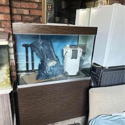 3 ft fish tank with the accessories to set up salt water aquarium ie pump, sand, live rock chemicals and test kiits. Can deliver if near