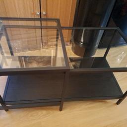 set of 2 coffee tables from ikea.Vittsjo.original price £75.00.black metal with wood shelf and glass tops.good condition few surface scratches on glass .from smoke and pet free home.