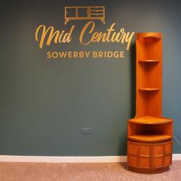Mid Century Sowerby Bridge

Nathan Squares Teak Tall Corner Cabinet

Open Shelves Incorporating Top Display Light

Double Cupboard Integrated Handles

Measurements H193cm x D45cm x W45cm

Collection from Mid Century Town Hall Street Sowerby Bridge, We are happy to liaise with couriers and would recommend Anyvan Or Shiply for quotations.

Please message me to arrange viewings
and check out my other items available

Items may show signs of wear and imperfections due to age