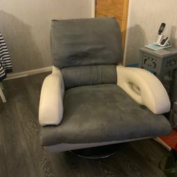 Lovely large swivel Grey and Cream chair. Arms and back are Cream Leather, seat is Grey soft suede material. Really comfy chair, measurements W84 cm D96 cm H93 cm. Collection only