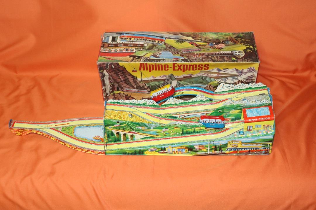 A Technofix No.300 Alpine Express Tinplate Clockwork Toy, comprising