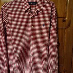 Polo Ralph Lauren  Casual  Shirt 
Size Large .
Red and White Check Pattern
And Blue Horse Logo 

In immaculate condition 

Only worn a few times unfortunately 
a bit too small for me .