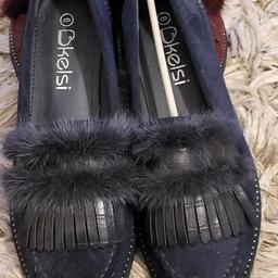 Brand new blue loafers with fur strip across front. bought just before crimbo but missed date to send back. excellent  condition  never been worn. can post if required.  absolute  bargain  also have burgundy  pair and will sell 2 for a tenner