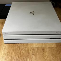 Ps4 pro 1tb white very good condition i really take care of my ps4 all this year work very nice 
One controller with but with noise inside but steel working perfectly