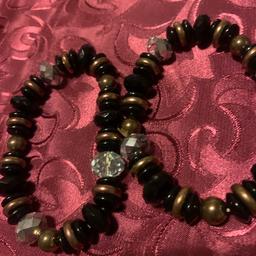 This are black and clear and gold bracelet not used much if like can post as bundle with other small items can save on postage 
Or collect