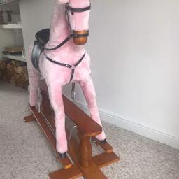 Absolutely stunning pink rocking horse that’s been very lightly played with over the years and so it’s in very good condition. The mane and tail have gone a little frizzy but otherwise it’s pristine. Has a sturdy solid wooden base, studded leather saddle and reins. 

Pink rocking horse now discontinued, but similar style ones are retailing around £425.

Anymore questions please feel free to ask.

Collection only please