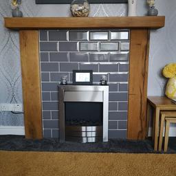 Fire surround comes in 3 pieces that can be done like the picture I have used. Tiles not included.
Height 123cm
Length 147cm
Depth 20cm.

Wood is extremely heavy.