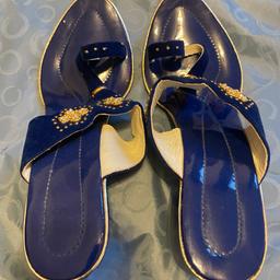 Indian slippers
Will fit UK Size 3.5 to 4
Only worn once for a short period so excellent condition 
Blue with Diamante and gold design