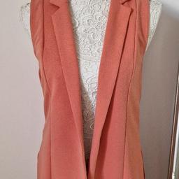 Atmosphere sleeveless long line jacket size 8 from Atmosphere NEW WITH TAGS. Lovely salmon pink colour.