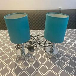 Pair of touch, bedside lamps in chrome, with turquoise lampshades, in vgc, approx 12" tall including shades.
