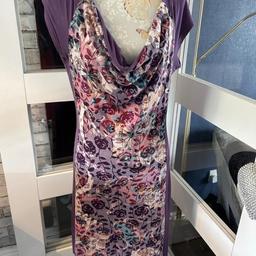 Purple Floral Dress Size 3 ( 10).

Can’t make out the designer label - see photos

Made in Nepal

T shirt stretchy style dress in good condition

Ls