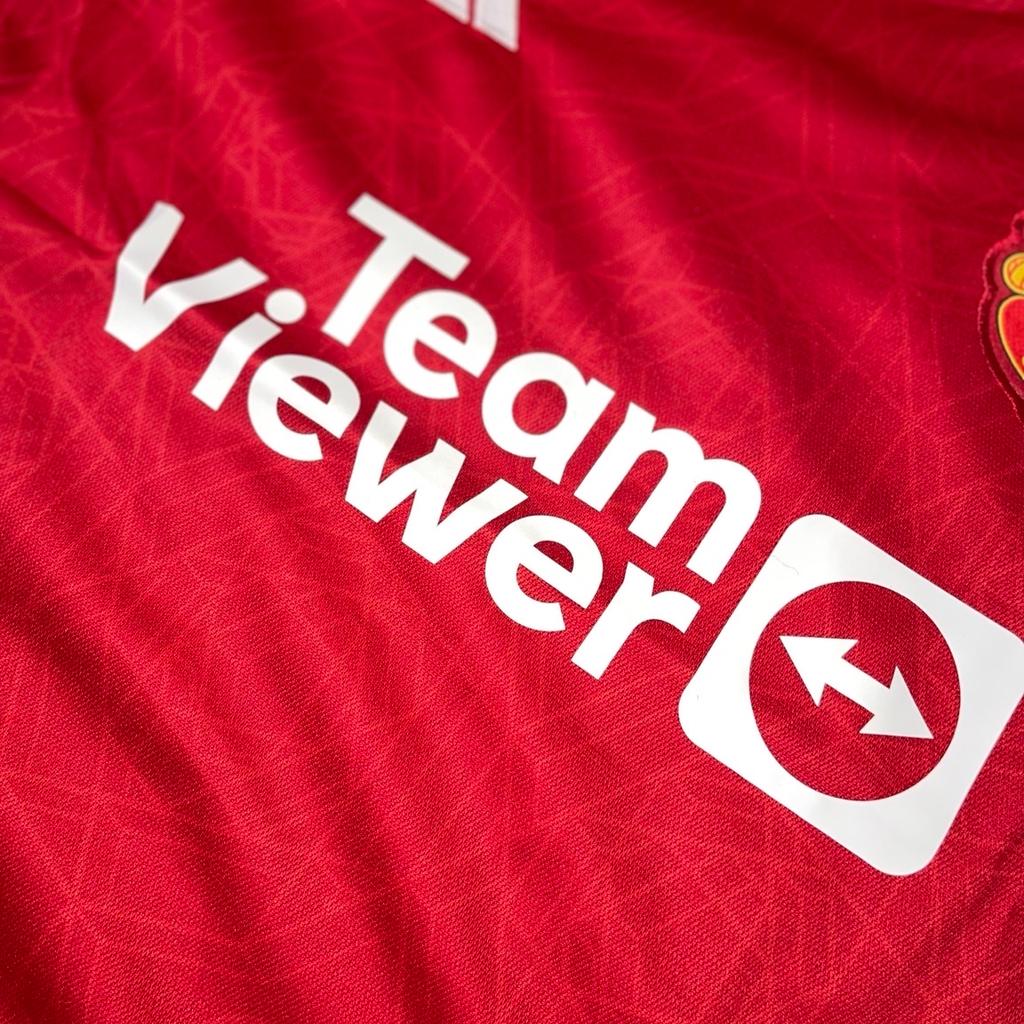 Show your support for one of the greatest football clubs in the world with this Manchester United 23/24 Home Shirt. The iconic red shirt is perfect for any fan looking to represent their favourite team. Made from high-quality materials, this shirt is designed to provide maximum comfort and durability. Whether you are heading to the stadium or watching the game from home, this shirt is the perfect way to show your support for Manchester United. Don't miss out on the opportunity to own this piece of football history.

Available in all Men’s sizes.